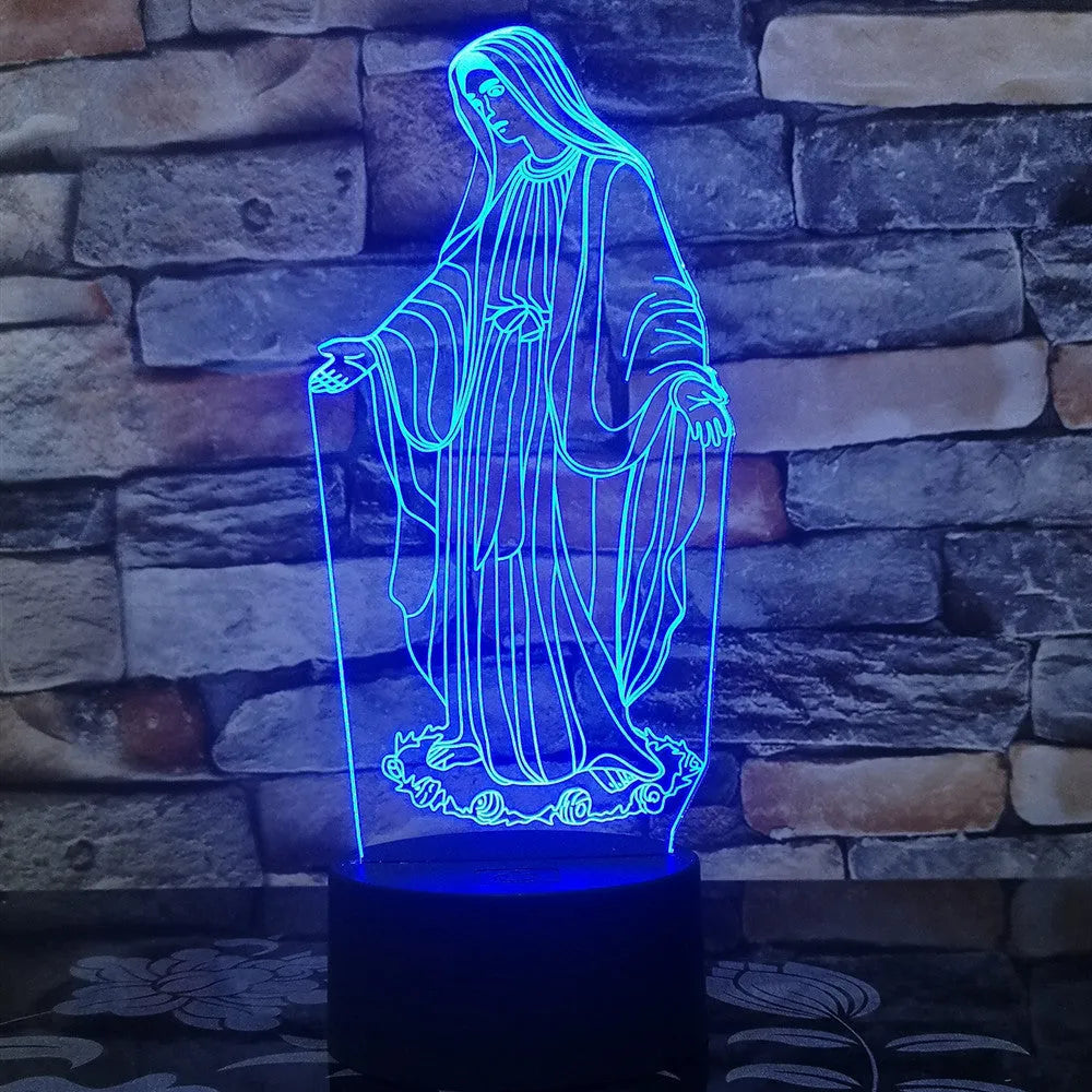 3D LED night light showing colourful dual ring pattern, with remote control and USB cable.
