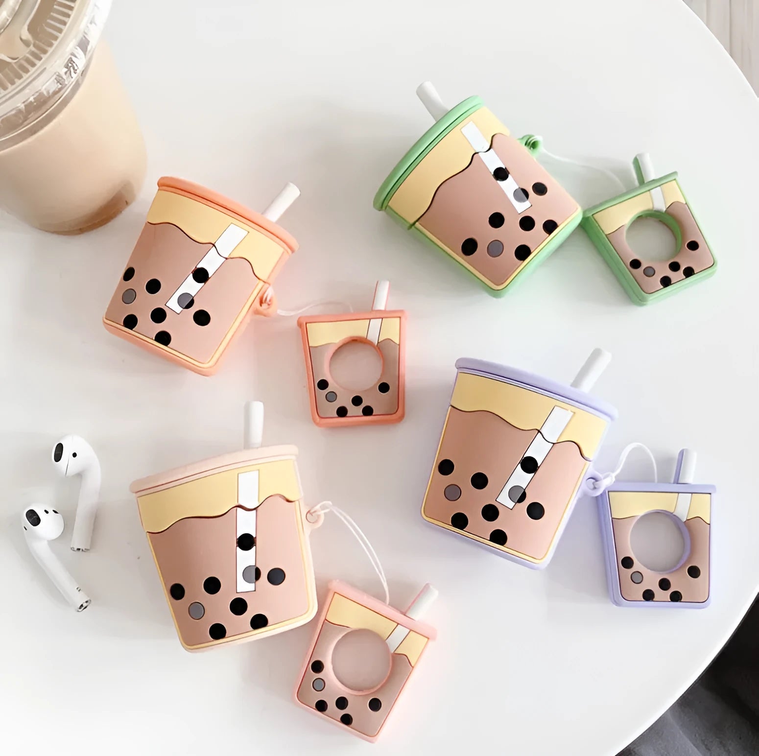 Milk tea silicone earphone cover for Apple AirPods 2nd generation in green, orange, pink, purple colours on white background