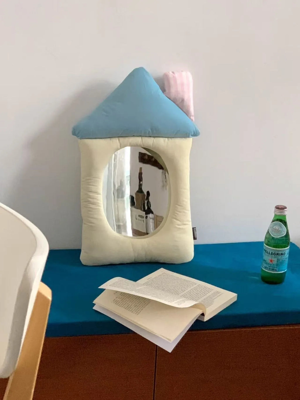 Korean-style decorative wall mirror with cotton-filled fabric backing in apple green colour