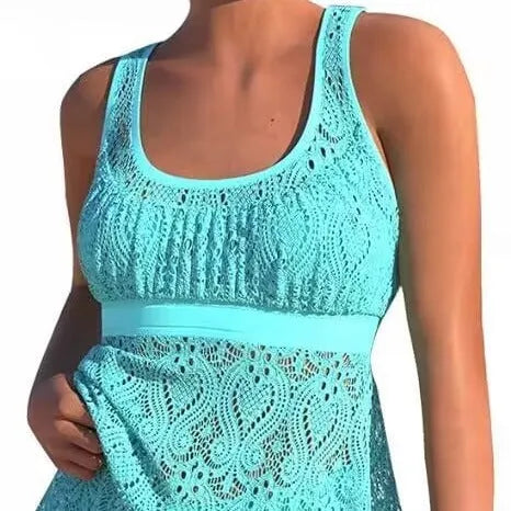 Women's solid colour conservative two-piece swim set with sleeveless top and brief pants for swimming.