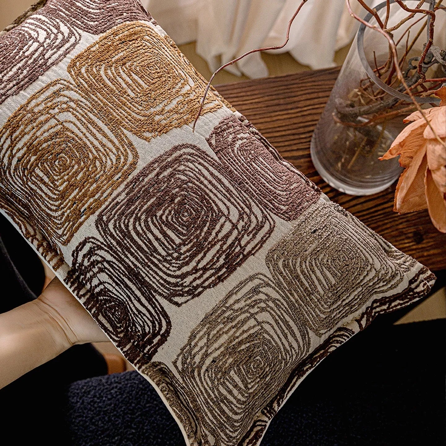 Square cream and coffee abstract coil pillow cover made of feather velvet polyester in 50x50cm or 30x50cm size.