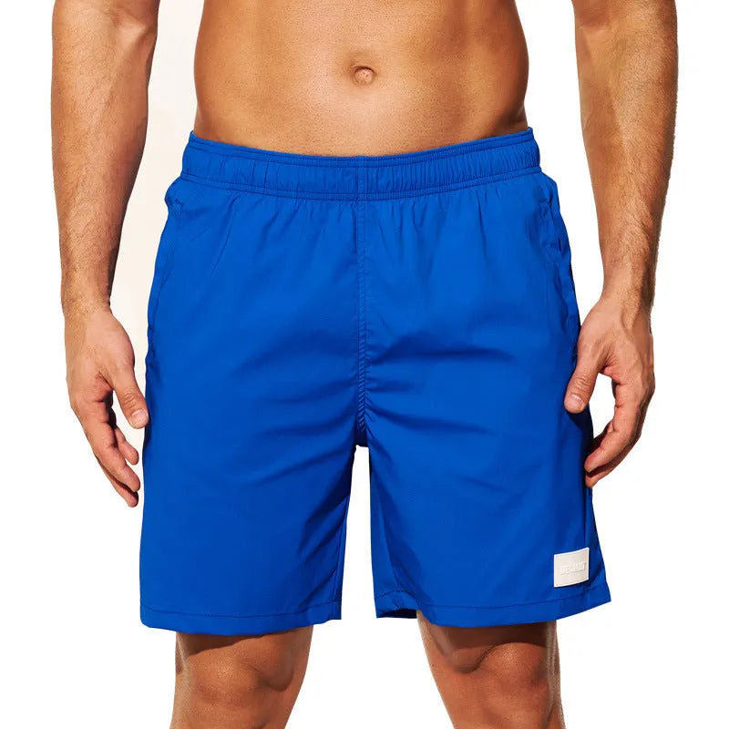 Men's quick-drying nylon sports shorts in solid colours with straight-leg style