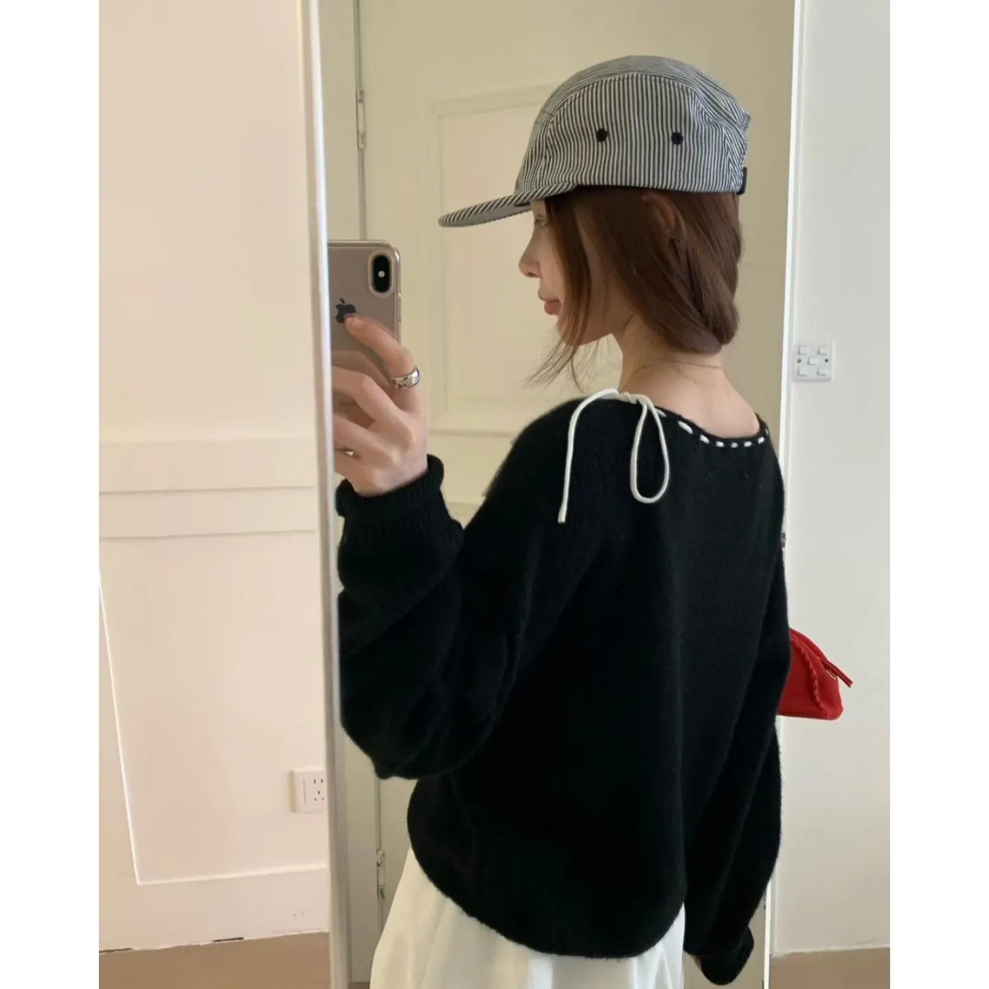 Women's loose grey pullover knitwear top made from regenerated cellulose fibre