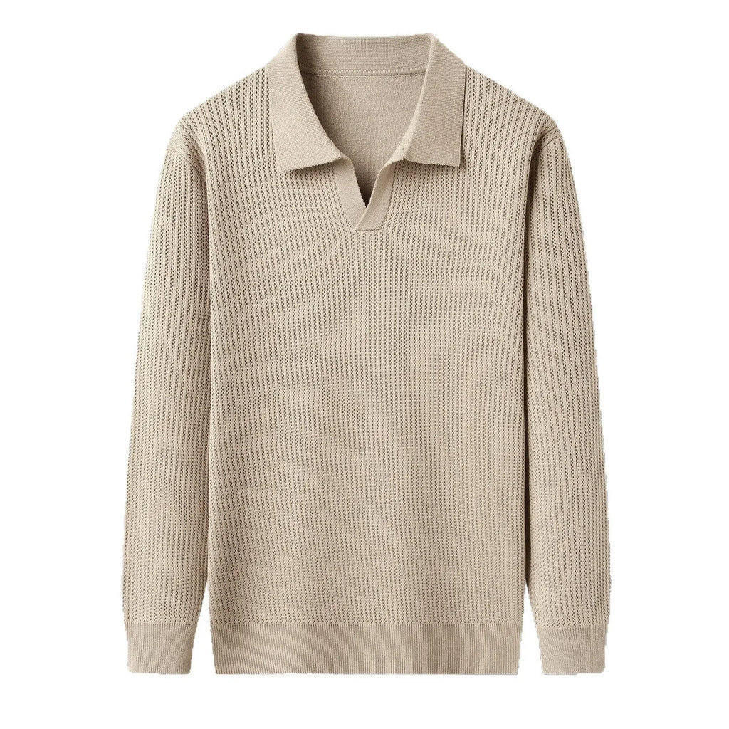 Man wearing a loose green casual pullover sweater for autumn.