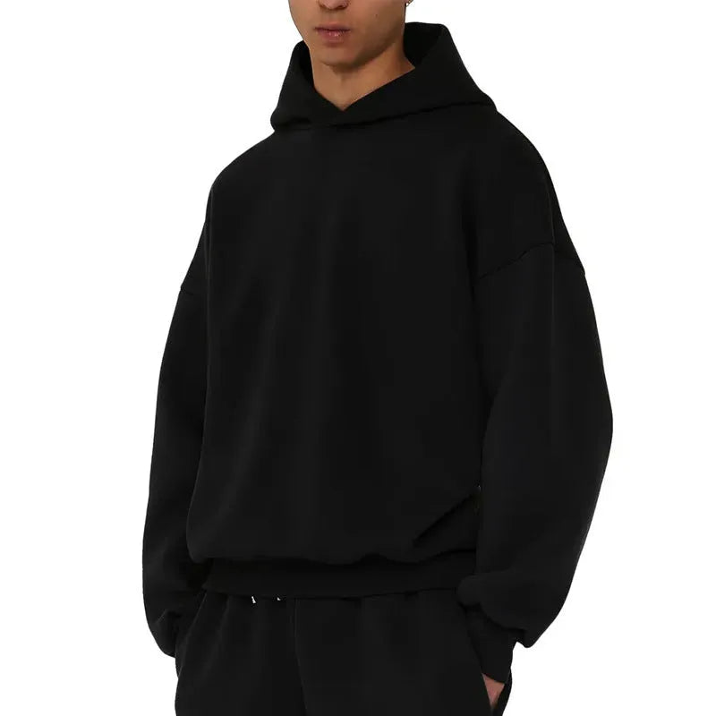 Men's solid colour fleece-lined cotton pullover sweatshirt hoodie with wool lining.