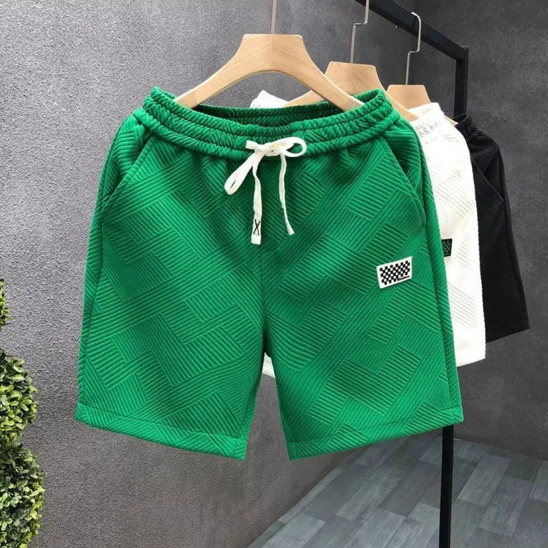Men's American style casual sports shorts in white, black, and green colours with elastic waist