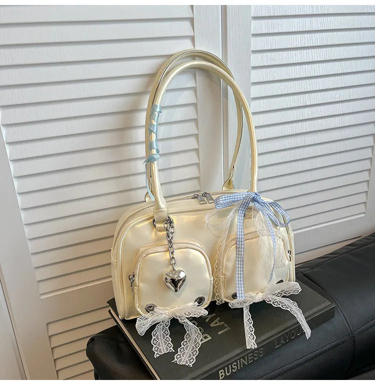 Horizontal square PU leather shoulder bag with double straps and interior phone compartment in beige colour