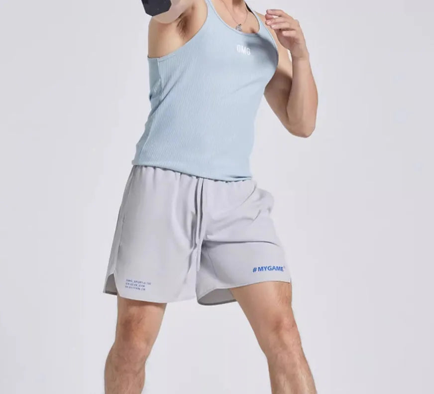 Men's fitness training shorts in four-point design, shown in available colours.