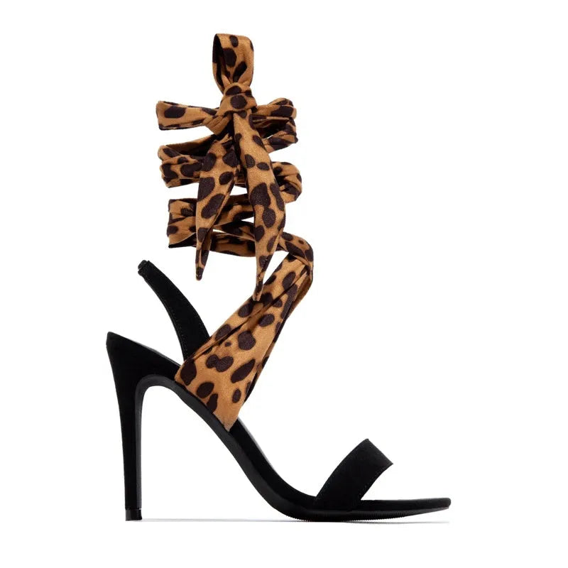 Light brown leopard print women's high heels with Roman cross straps and a high thin heel