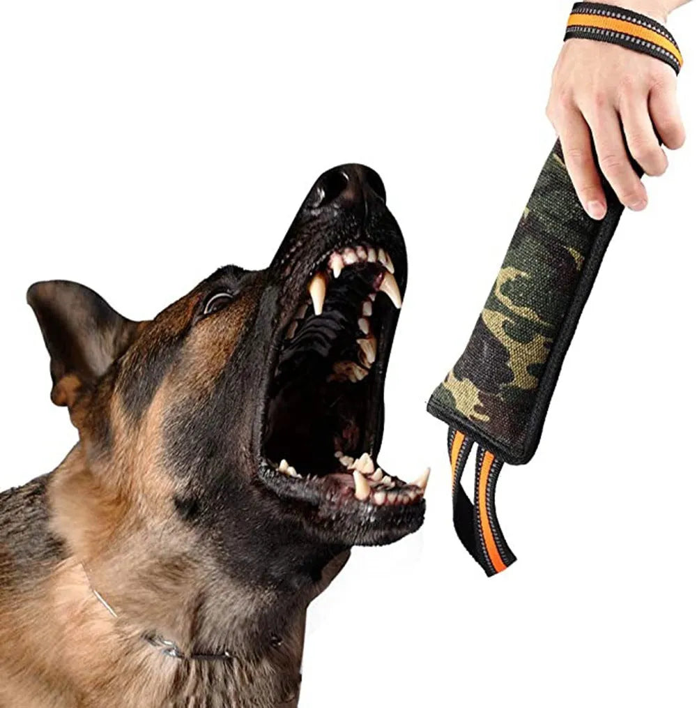 Reflective dog training bite stick with jute surface and yellow edge, 55cm total length, on outdoor ground