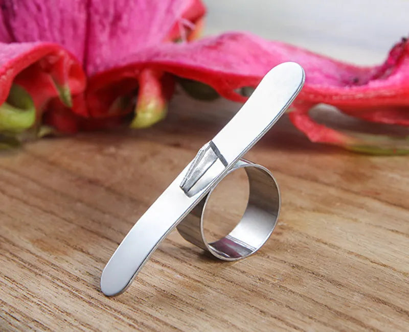 Silver stainless steel ring peeler for citrus fruits including oranges and pomelo