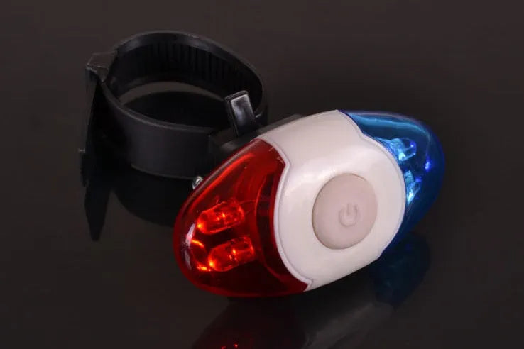 Red and blue LED tail light with adjustable mounting base showing horizontal and vertical positioning options