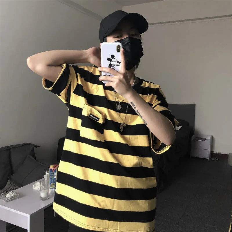 Striped short sleeve t-shirt in polyester fibre, available in blue and yellow, sizes L to XXL.