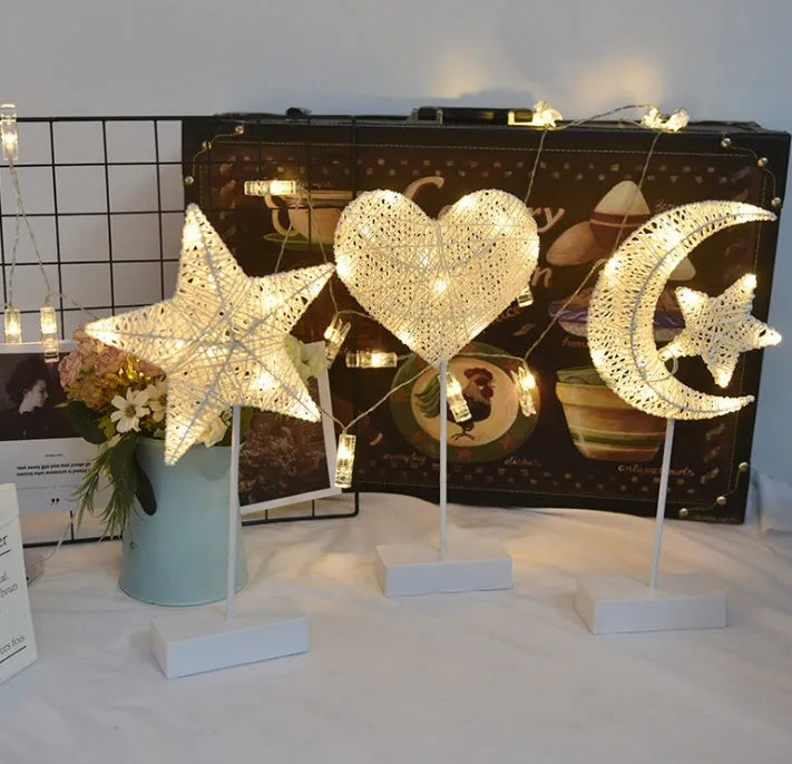 Rattan LED decorative light set showing star, heart and moon designs with copper wire details