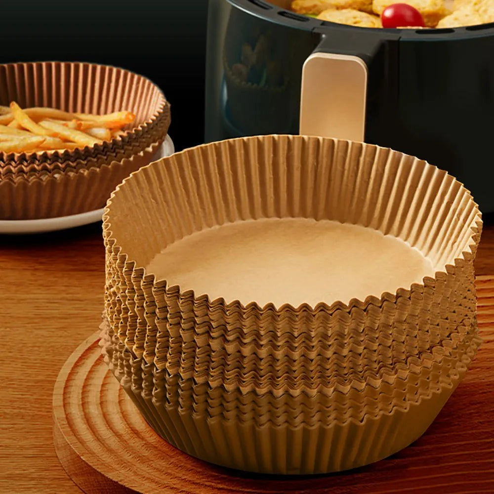 White round disposable food-grade parchment air fryer liner with 4.5cm raised edge, 16cm diameter