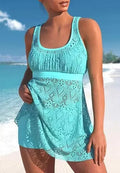 Women's solid colour conservative two-piece swim set with sleeveless top and brief pants for swimming.