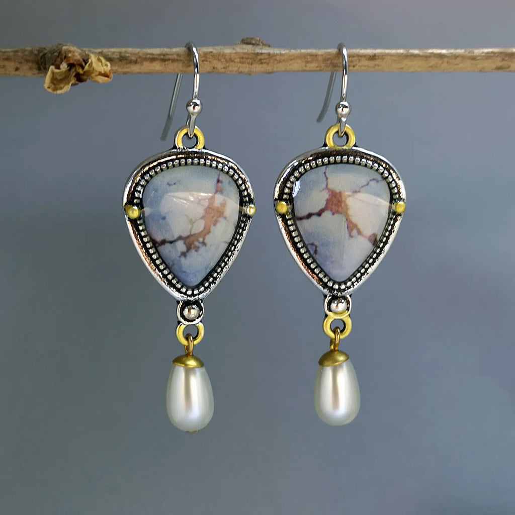Retro blue geometric drop earrings with synthetic opal and pearl detailing on two-tone electroplated metal