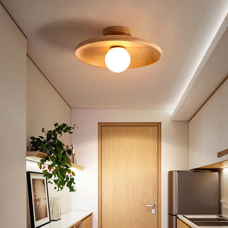Modern solid wood ceiling lamp with glass shade in light wood and walnut colour finishes.