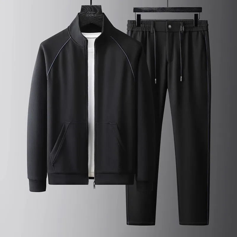 Man wearing a stand collar Vinylon sports suit set in slim fit, showing the coat and trousers.
