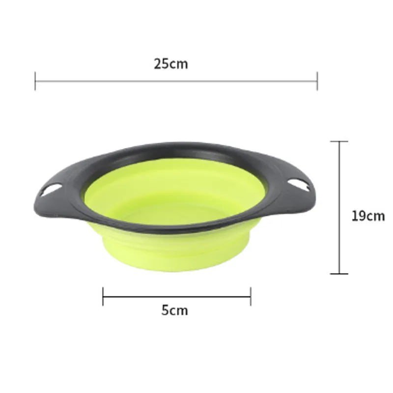 Silicone folding bowl for pets in black and green, collapsed flat for storage, portable outdoor cat and dog food bowl