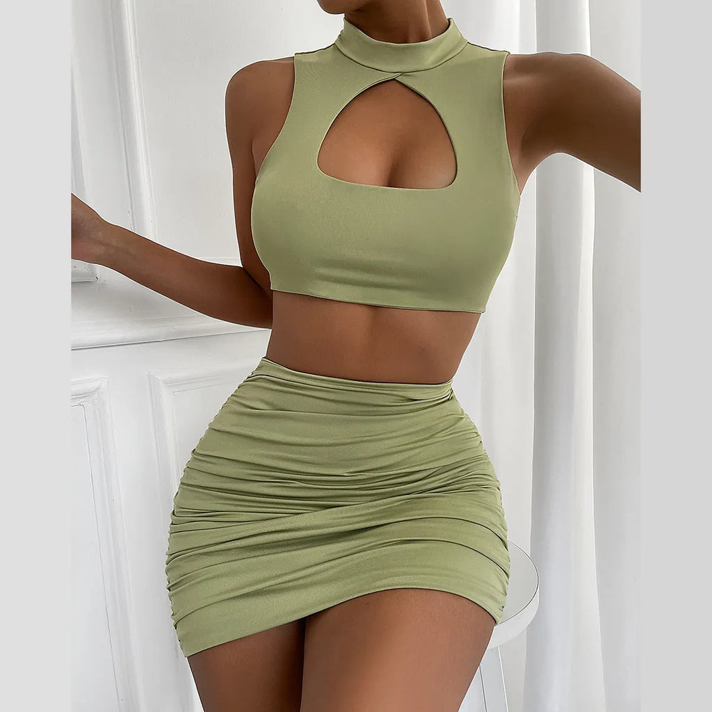 Women's light purple hollow vest and split skirt two-piece set shown on model