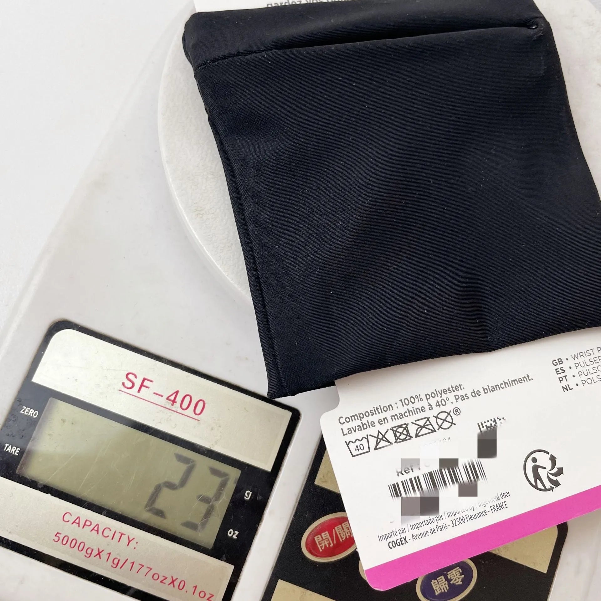 Wrist bag armband sleeve showing 10 x 10.5 cm dimensions for mobile phone storage