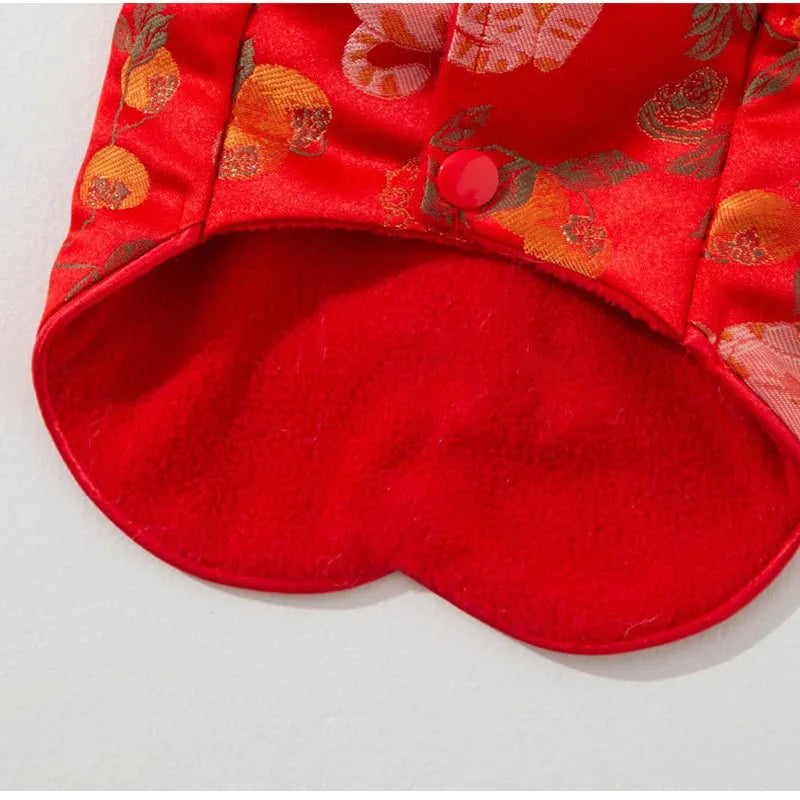 Red cheongsam pet vest with decorative knot buttons, floral and fruit patterns, for Lunar New Year
