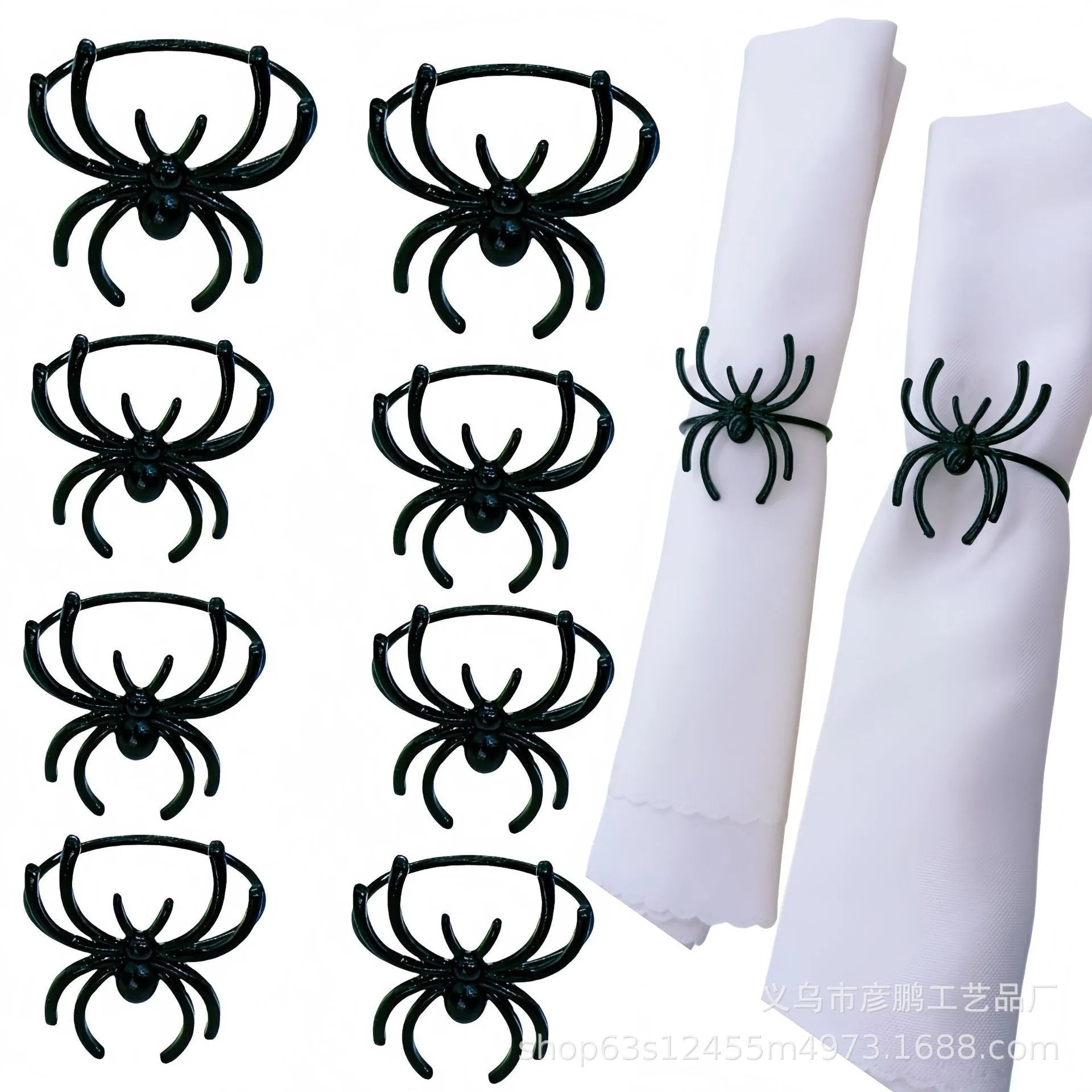 Six black alloy spider-shaped napkin rings for Halloween table decoration on a dark surface.
