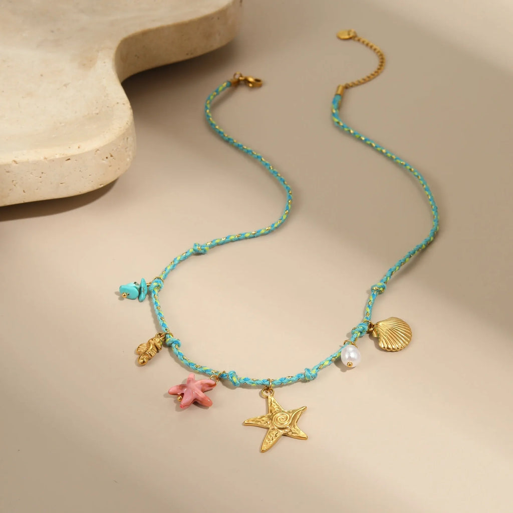 Handmade braided rope titanium steel necklace or bracelet with 18K gold electroplating in purple, pink, or blue styles.