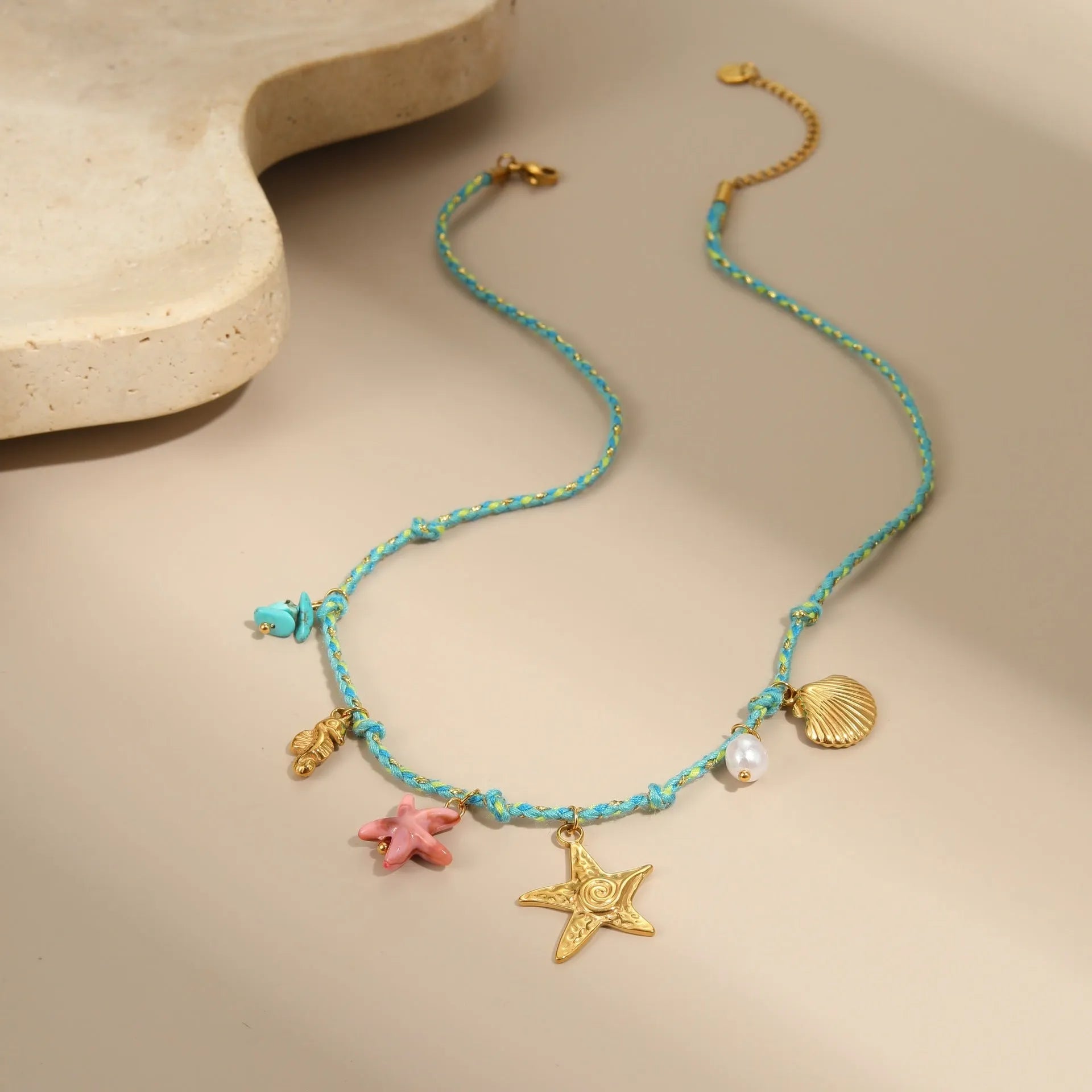 Handmade braided rope titanium steel necklace or bracelet with 18K gold electroplating in purple, pink, or blue styles.