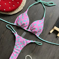Backless one-piece swimsuit with a heart print and split side detail