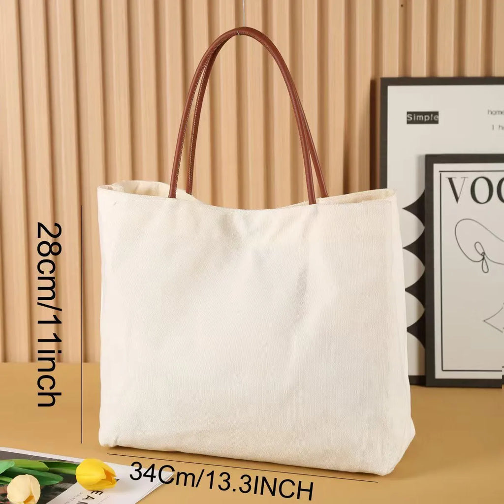 Natural cotton canvas tote bag in beige white and white colours with large main compartment