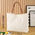Natural cotton canvas tote bag in beige white and white colours with large main compartment