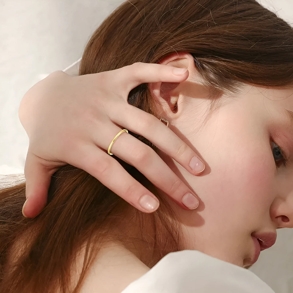 Geometric sterling silver bracelet ring with round design elements shown in three metal colour options
