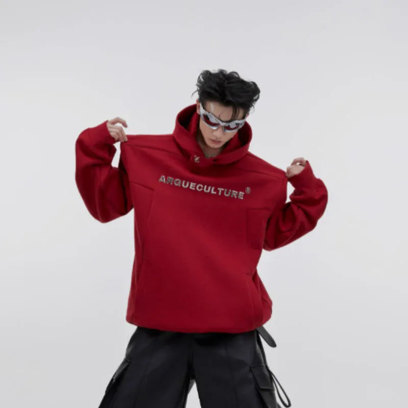 Men's black hooded sweater with metal 3D graphic print, loose fit, and heavy shoulder pads.