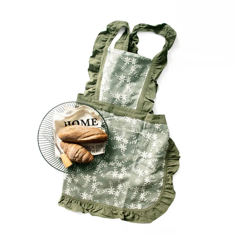 Minimalist cotton linen lace X strap apron in light pink on a white background