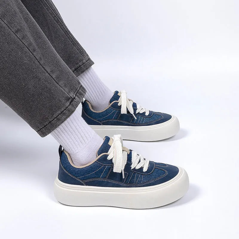 Raised bottom canvas shoes for men in black with breathable mesh lining and platform sole