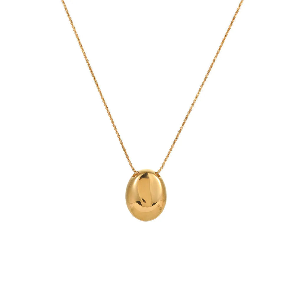 Gold geometric pendant necklace on adjustable chain with stainless steel construction