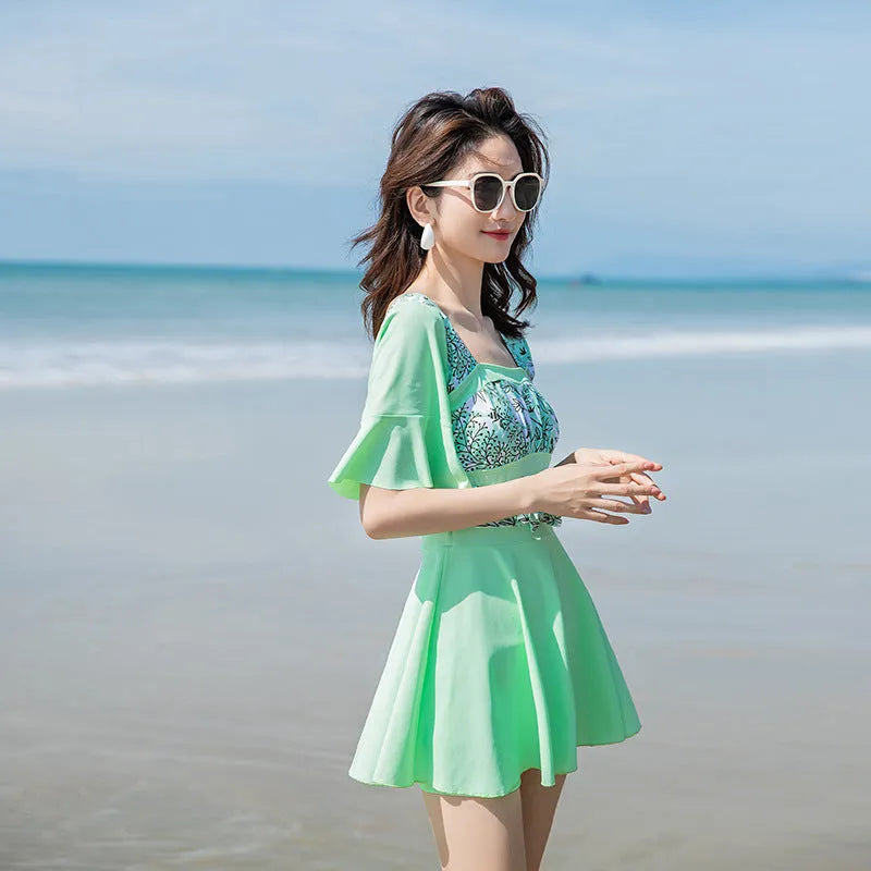 Women's printed one-piece swimsuit in green and blue colour options, chemical fibre blend fabric, Asian sizes M to 2XL