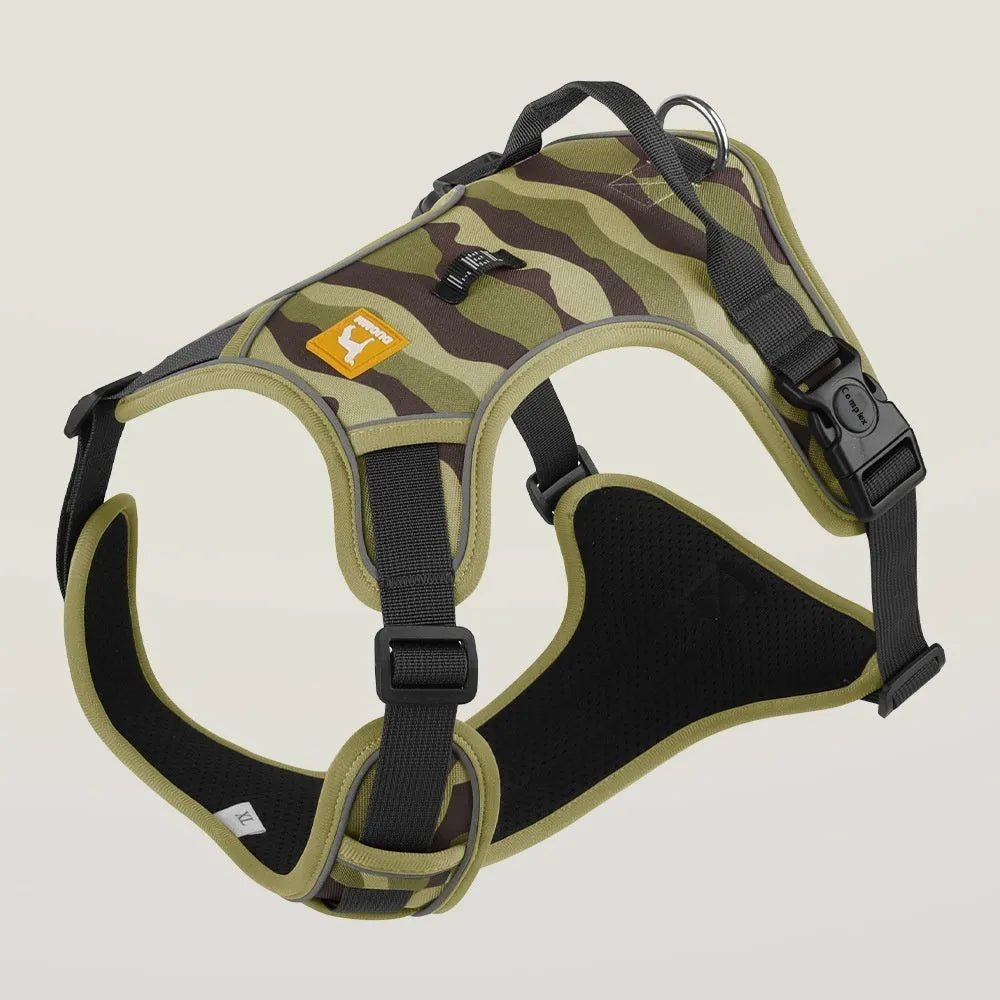 Orange reflective dog harness with chest and back straps and a hand-holding rope clip.
