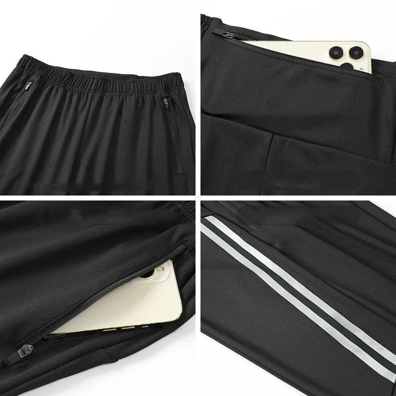 Man wearing black full-length polyester running trousers with a mid waist.