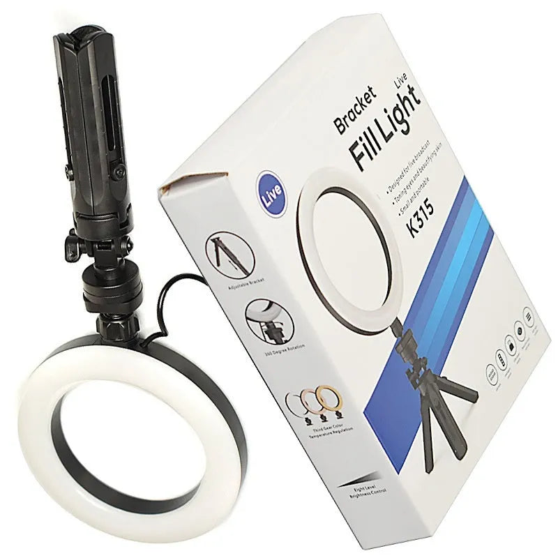 Black desktop fill light tripod suit holding a mobile phone for live streaming video.