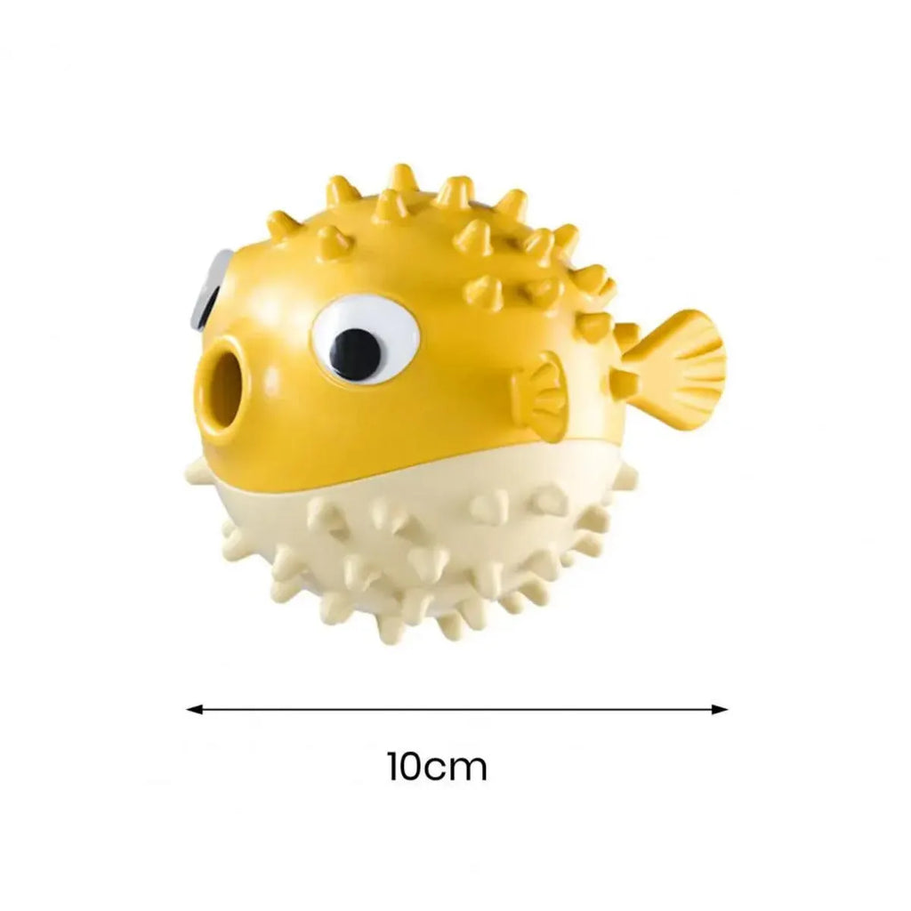 Yellow fish-shaped vinyl dog chew toy with textured surface and squeaker inside.