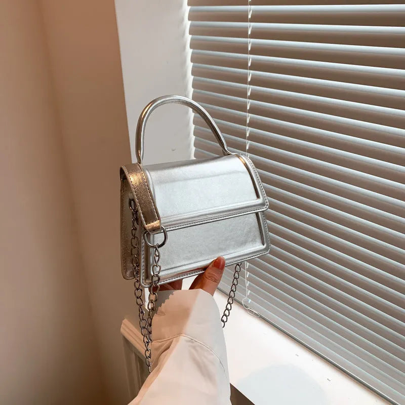 Retro PU crossbody bag in horizontal square shape with sewing line details