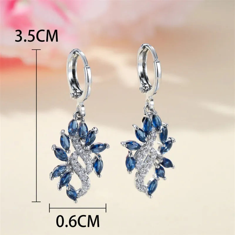Women's simple minority all-match earrings in platinum sapphire blue alloy on display