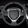 Black car steering wheel cover with two-colour line detail showing Napa leather texture and rubber inner ring