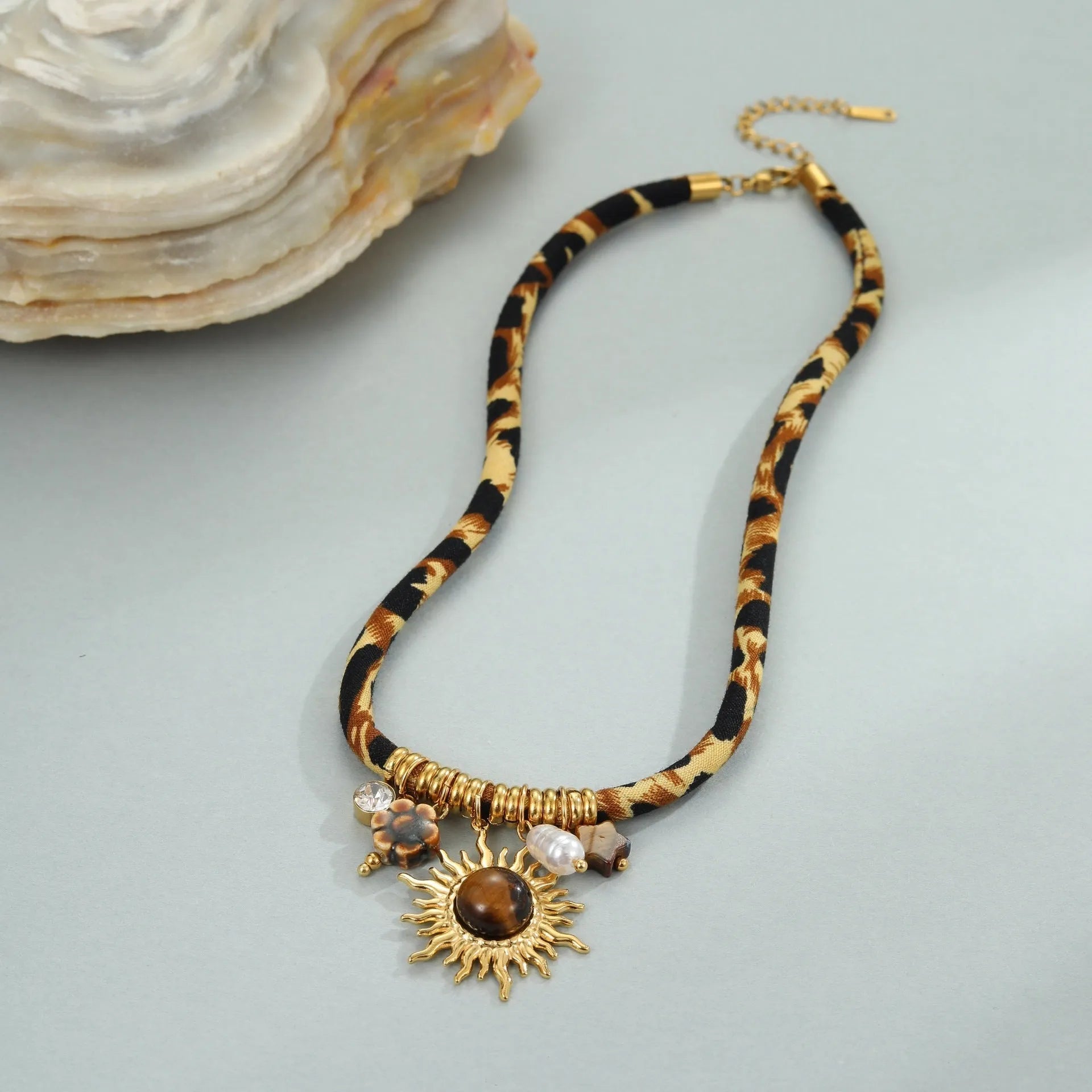Women's stainless steel necklace with geometric leopard pendant on adjustable chain