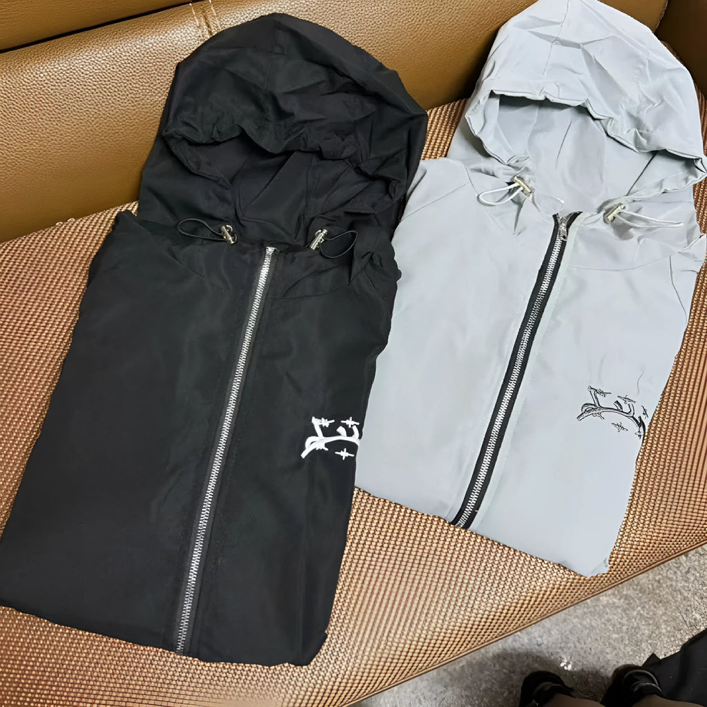Men's loose hooded sunscreen jacket in grey polyester fabric showing British style tailoring