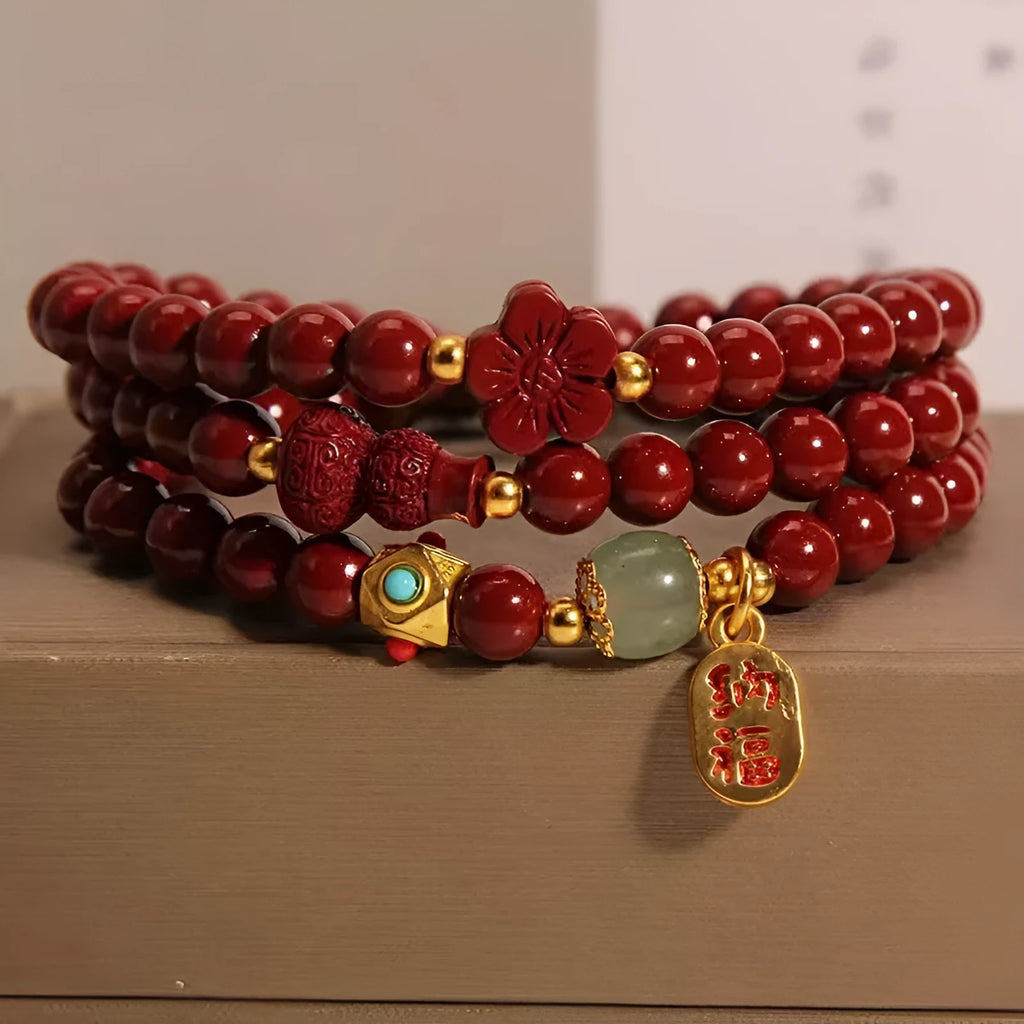 Multi-circle cinnabar bracelet with gourd and five petal flower motifs, polished finish, 6mm beads