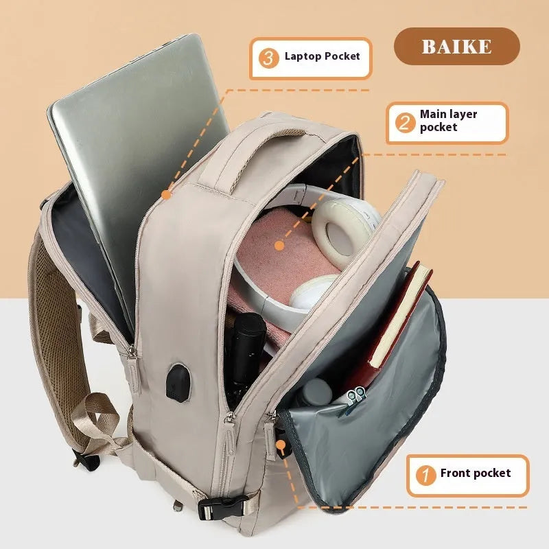 Large grey waterproof Oxford cloth travel backpack with curved shoulder straps shown front view.